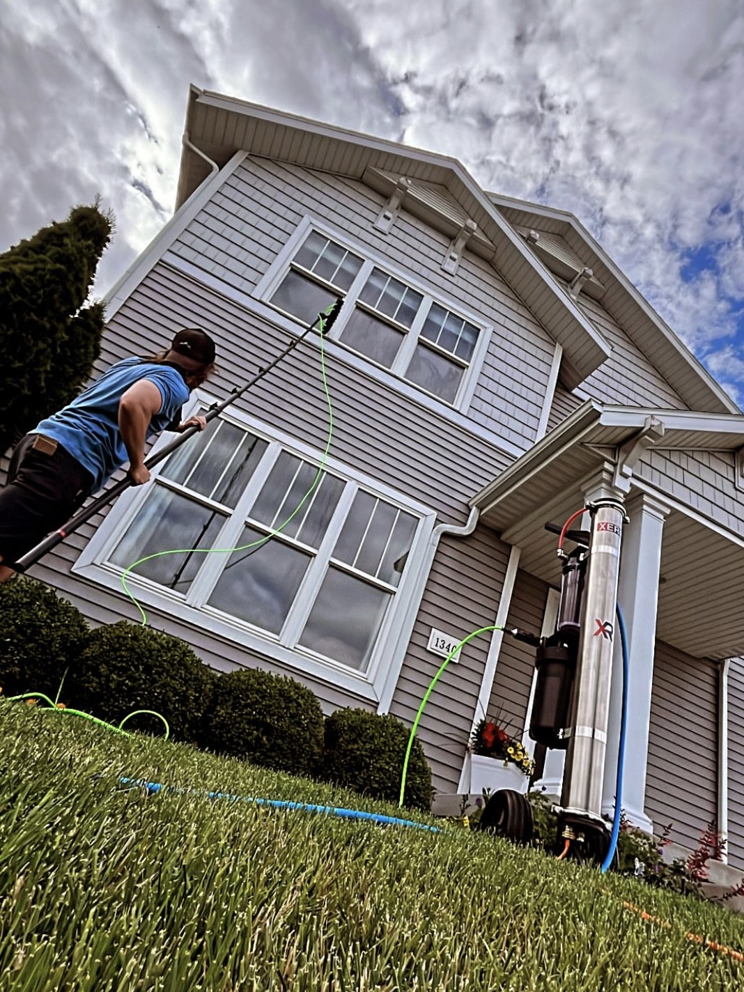 Summit Window Washing technician cleaning windows